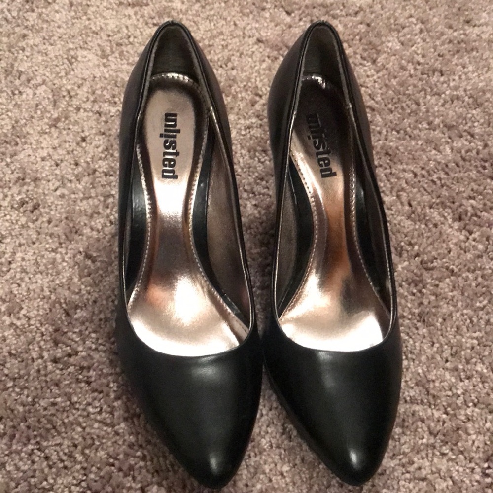 Black unlisted heels